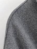 מעיל “ליוויה” – מעיל מיד-לנגת אלגנטי עם חגורה וחזות נקייה לסתיו וחורף