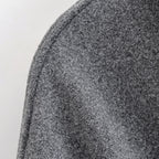 מעיל “ליוויה” – מעיל מיד-לנגת אלגנטי עם חגורה וחזות נקייה לסתיו וחורף